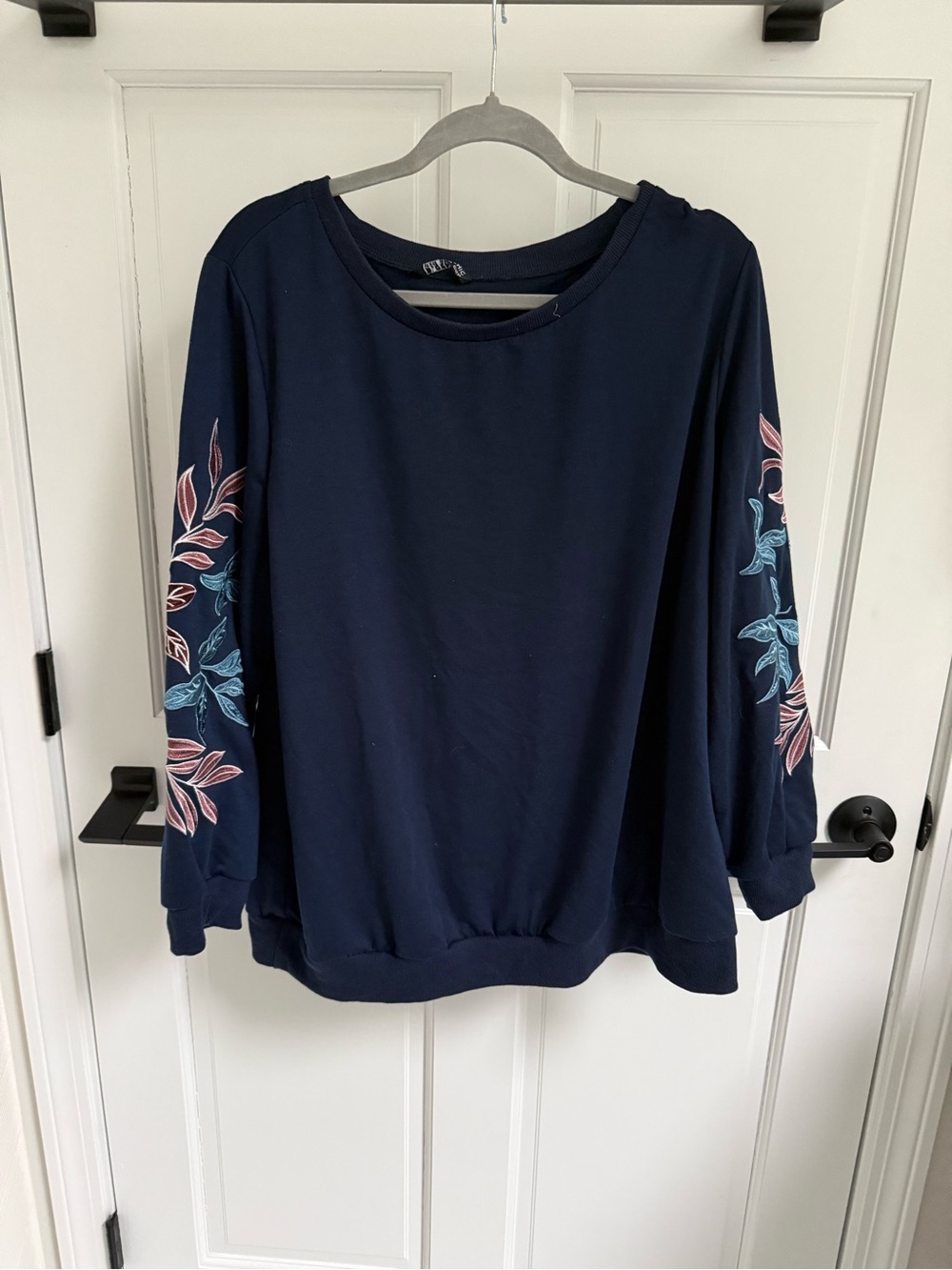 BloomChic Navy Sweatshirt with Pink & Light Blue Floral Sleeve Embroidery